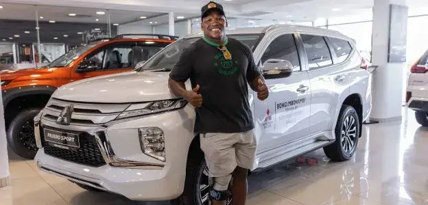 springboks-player-bongi-mbonambi-next-to-his-sponsored-pajero-sport